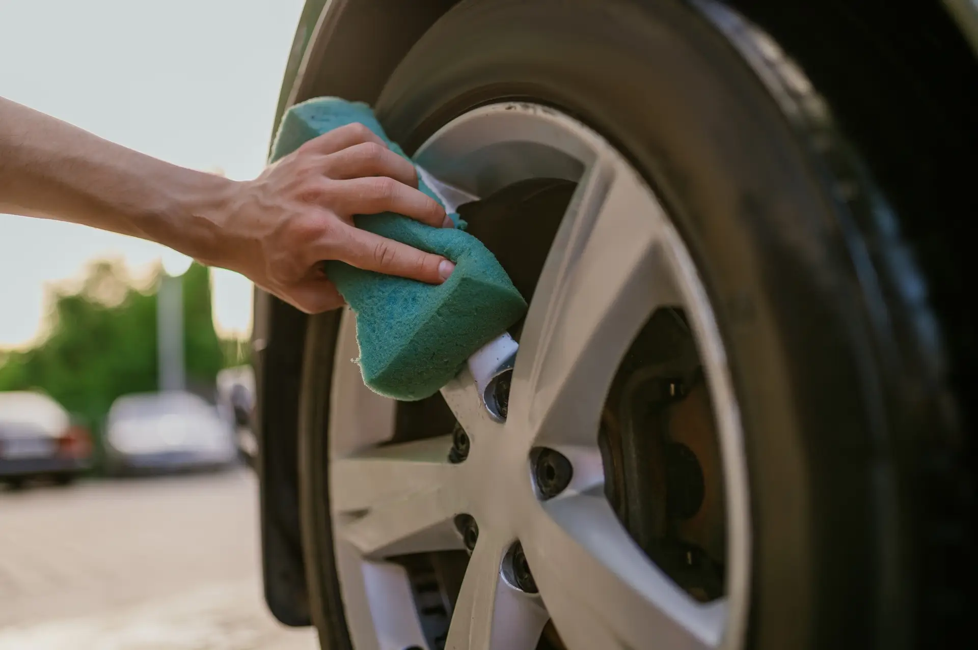 Man using sponge, hand car wash